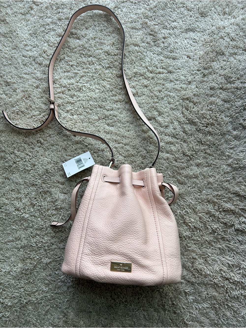 kate spade Blush Pink Pebbled Leather Drawstring Crossbody